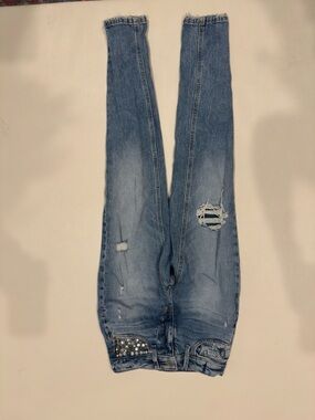 Women’s Light Blue Distressed Skinny Jeans with Stud Detail